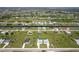 Expansive aerial view of homes in a well-planned community with canals and green spaces at 221 Rotonda S Blvd, Rotonda West, FL 33947