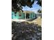 Spacious backyard with covered patio, perfect for outdoor entertaining and relaxing at 431 David Ct, Palm Harbor, FL 34684