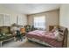 Bedroom featuring a window with natural light and a closet at 26098 Copiapo Cir, Punta Gorda, FL 33983