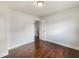 Bright bedroom featuring hardwood floors, white walls, and a closet at 1207 Lorie Cir, Brandon, FL 33510