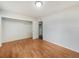 Bright bedroom with hardwood floors and closet, freshly painted at 1207 Lorie Cir, Brandon, FL 33510
