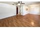 Open living space featuring wood floors, recessed lighting, and seamless flow for modern living and entertaining at 1819 E Humphrey St, Tampa, FL 33604