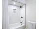 Bathroom featuring a shower/tub combo and toilet at 21940 Dupree Dr, Land O Lakes, FL 34639