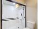 Modern bathroom with walk-in shower and bronze hardware at 21940 Dupree Dr, Land O Lakes, FL 34639