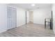 Bedroom with wood-look flooring and closet at 21940 Dupree Dr, Land O Lakes, FL 34639