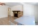 Spacious living room featuring a decorative stone fireplace and tile flooring at 21940 Dupree Dr, Land O Lakes, FL 34639