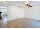 Spacious room with wood flooring and a ceiling fan at 21940 Dupree Dr, Land O Lakes, FL 34639