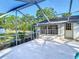 Screened patio with outdoor living space at 21940 Dupree Dr, Land O Lakes, FL 34639