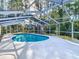 Beautiful in-ground screened pool at 21940 Dupree Dr, Land O Lakes, FL 34639