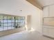 Sunroom featuring natural light, tile flooring, and a serene view at 21940 Dupree Dr, Land O Lakes, FL 34639