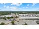 An aerial view of retail stores Dillards and JC Penney with parking in the foreground at 3772 Bath Ln, North Port, FL 34288