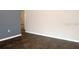 Living room featuring hardwood floors, base molding, and neutral paint color at 3841 Chaffey Dr, New Port Richey, FL 34652