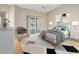 Staged bedroom with a modern design and sliding glass door leading to the outdoor patio at 1171 Clays Trl, Oldsmar, FL 34677