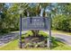 A sign for the St. Andrews community amid lush landscaping at 1171 Clays Trl, Oldsmar, FL 34677