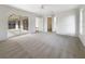 Large main bedroom with carpet, a ceiling fan, ample natural light, and sliding glass doors to the outside at 3403 30Th E Ln, Bradenton, FL 34208