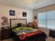 Fun bedroom featuring a bed, neutral carpet, and various playful wall decorations at 3721 Heron Island Dr, New Port Richey, FL 34655