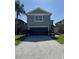 Stunning two-story home featuring a well-maintained lawn, and a two-car garage at 3721 Heron Island Dr, New Port Richey, FL 34655