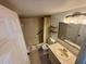 Bathroom featuring a shower and tub combination at 721 83Rd N Ave # 108, St Petersburg, FL 33702