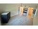 Spacious bedroom with a view of an open closet and tile floors offering a fresh feel at 721 83Rd N Ave # 108, St Petersburg, FL 33702