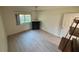 This bright bedroom features tile floors, a ceiling fan, and ample natural light from a large window at 721 83Rd N Ave # 108, St Petersburg, FL 33702