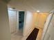 Hallway with closets and tile flooring at 721 83Rd N Ave # 108, St Petersburg, FL 33702