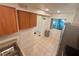 Kitchenette features wooden cabinets at 721 83Rd N Ave # 108, St Petersburg, FL 33702