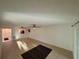 Spacious living area with tile floors, ceiling fans, and natural light, awaiting personal touches at 721 83Rd N Ave # 108, St Petersburg, FL 33702