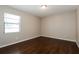 Bedroom with hardwood floors and a window for natural lighting at 1117 Mook St, Brandon, FL 33510