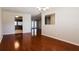 Dining area showcasing hardwood floors with views to living spaces, and lots of natural light at 1117 Mook St, Brandon, FL 33510