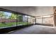 Enclosed patio area perfect for outdoor entertaining with views of the backyard at 1117 Mook St, Brandon, FL 33510