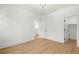 Bright bedroom featuring neutral walls and wood flooring, offering a serene retreat at 4115 N Central Ave, Tampa, FL 33603