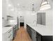 Modern kitchen with stainless steel appliances, sleek countertops, and ample cabinet space at 4115 N Central Ave, Tampa, FL 33603