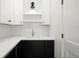 Stylish wet bar area showcasing modern cabinetry, sleek countertops, and contemporary fixtures at 4115 N Central Ave, Tampa, FL 33603
