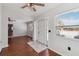 Inviting foyer with hardwood floors, a modern front door, and ample natural light at 75 Virginia Ct, Englewood, FL 34223