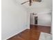 Hardwood flooring and modern ceiling fans create a welcoming and comfortable living area at 75 Virginia Ct, Englewood, FL 34223