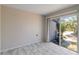 Bright room featuring tile floors and a sliding glass door to the outside at 75 Virginia Ct, Englewood, FL 34223