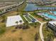 Volleyball court, bocce ball court, and pool area offer diverse recreational opportunities at 15242 Sunny Day Dr, Bradenton, FL 34211
