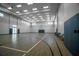Large indoor basketball court with great lighting, lines and hoops for great play at 15242 Sunny Day Dr, Bradenton, FL 34211