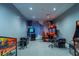 Fun-filled game room with various arcade games and comfortable seating for entertainment at 15242 Sunny Day Dr, Bradenton, FL 34211