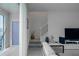 Bright living room with staircase, light blue door, and tile flooring at 15242 Sunny Day Dr, Bradenton, FL 34211