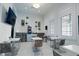 Bright and inviting lounge area with modern decor, comfortable seating, and natural light at 15242 Sunny Day Dr, Bradenton, FL 34211