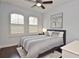 Comfortable bedroom with neutral walls and plush carpeting for relaxation at 1966 Hyde Park St, Sarasota, FL 34239