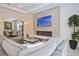 Spacious living room with a modern fireplace and an open view to the dining area at 1966 Hyde Park St, Sarasota, FL 34239