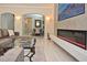 Inviting living room featuring a sleek fireplace, open floor plan, and stylish decor at 1966 Hyde Park St, Sarasota, FL 34239