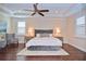 This main bedroom features a tray ceiling, recessed lighting, and private windows at 1966 Hyde Park St, Sarasota, FL 34239