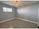 A tranquil bedroom is bright with light, features tile floors and decorative lighting at 3735 Alabama Ne Ave, St Petersburg, FL 33703