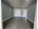 A large bedroom featuring hardwood floors, neutral walls, and recessed lighting at 3735 Alabama Ne Ave, St Petersburg, FL 33703