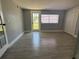 Bright bedroom offers tile floors, lots of sunlight, and a door leading to the backyard at 3735 Alabama Ne Ave, St Petersburg, FL 33703