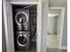 Convenient laundry closet features stacked washer and dryer units for efficient space saving at 3735 Alabama Ne Ave, St Petersburg, FL 33703