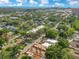 Panoramic aerial view featuring a community, lush greenery, and distant city skyline at 4409 W Gray St # 5, Tampa, FL 33609